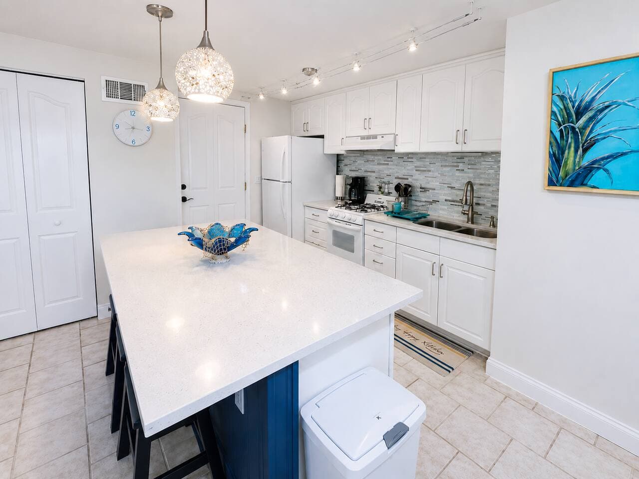Bright modern kitchen with spacious island and stylish coastal touches